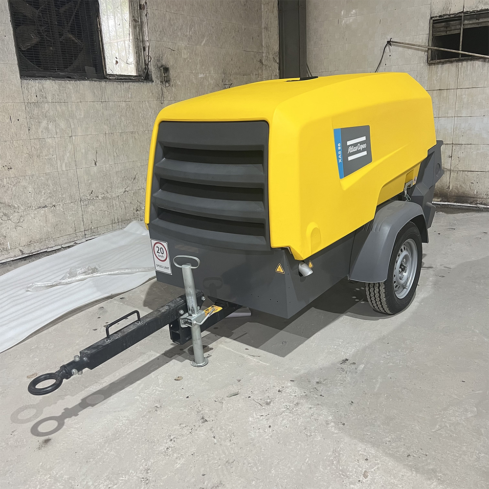 Atlas Copco XAS88 Diesel Air Compressor: Fast Air Delivery to Construction Site via Air Freight!